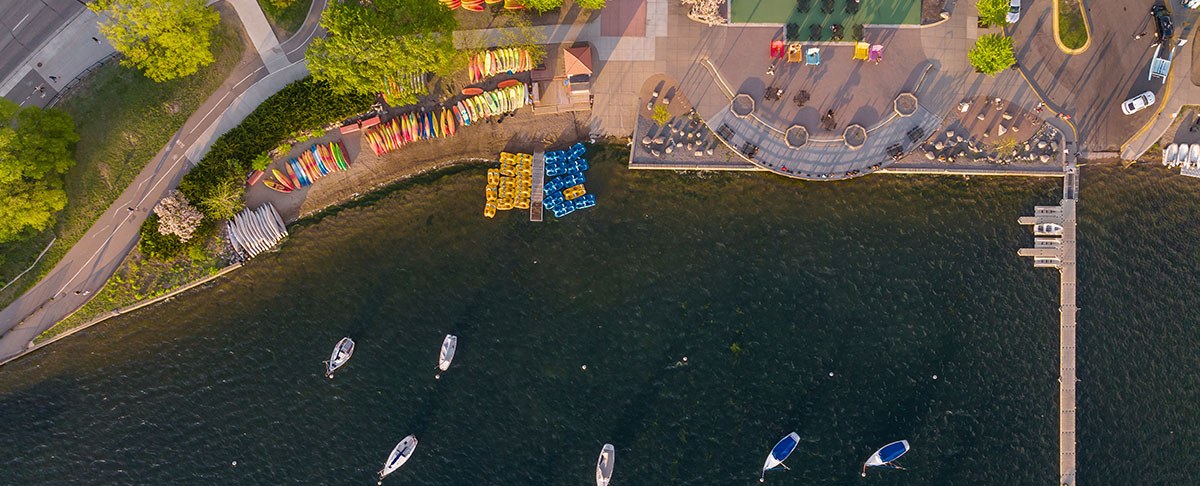 an overview shot of minneapolis lake with boats in the water