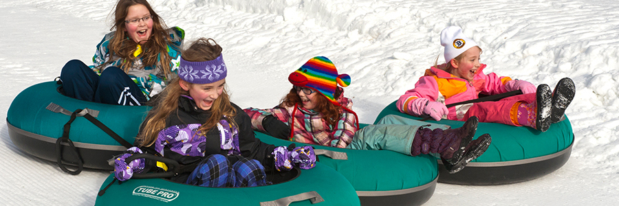 girls snow tubing girls snow tubing
